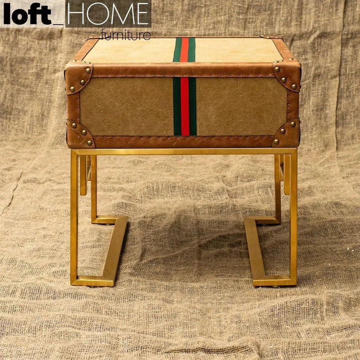 Vintage canvas side table guccio with context.