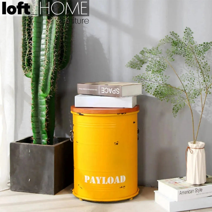 Industrial metal side table container round with context.