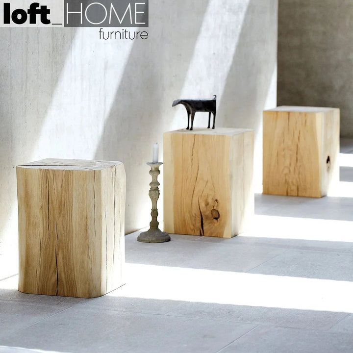 Rustic wood side table root with context.