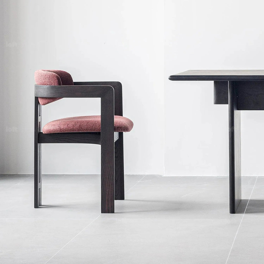 Japandi boucle fabric/leather dining chair semi circle in close up details.