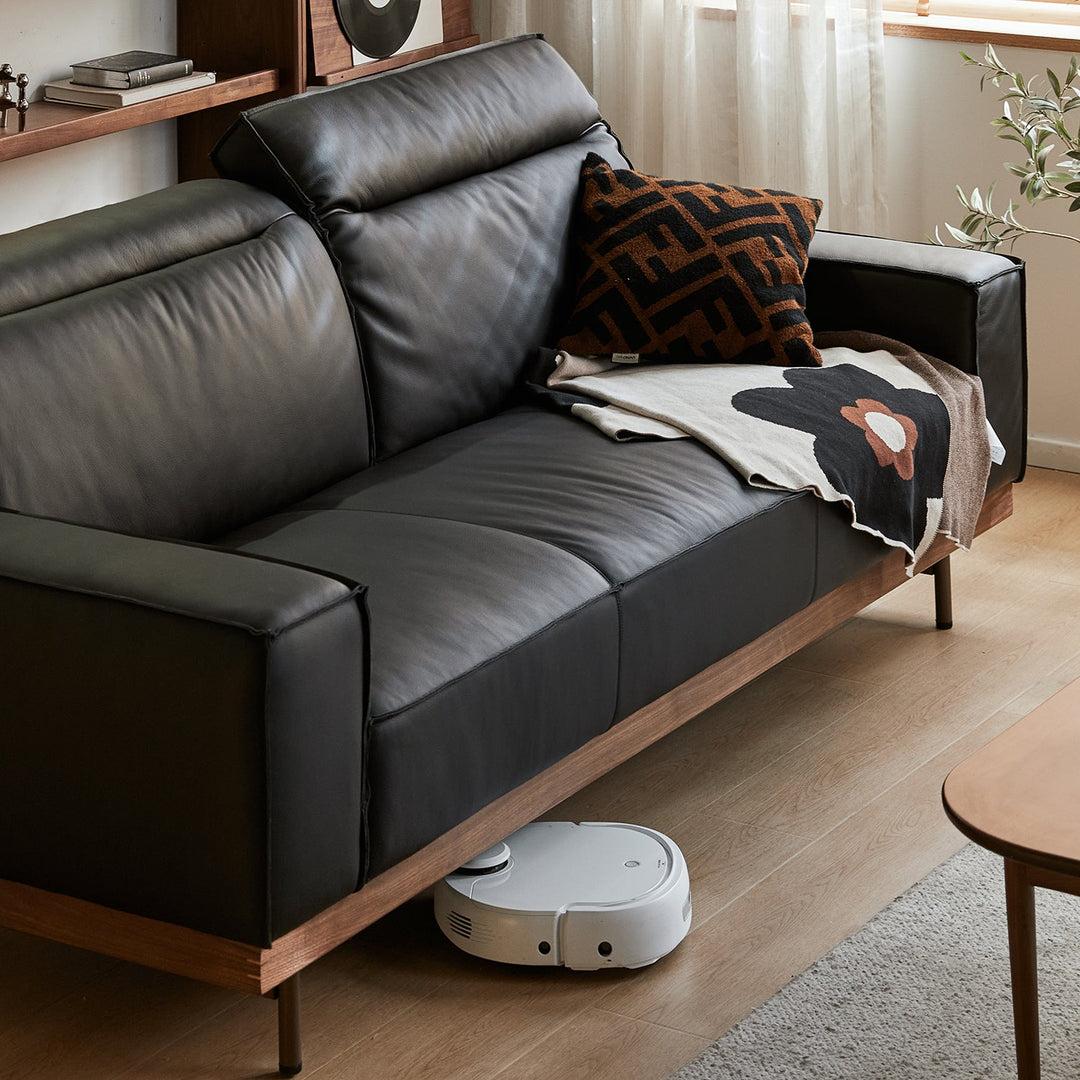 Japandi genuine leather 3 seater sofa river with context.