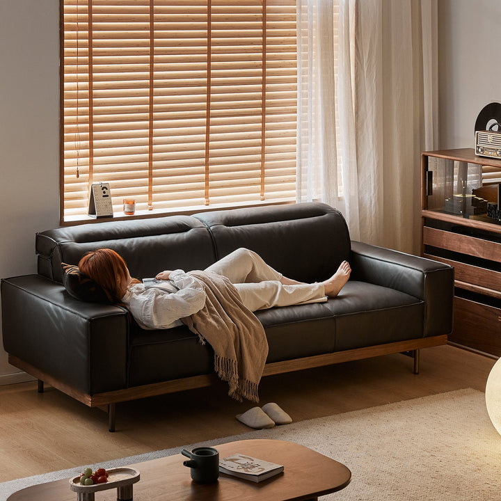 Japandi genuine leather 3 seater sofa river in still life.