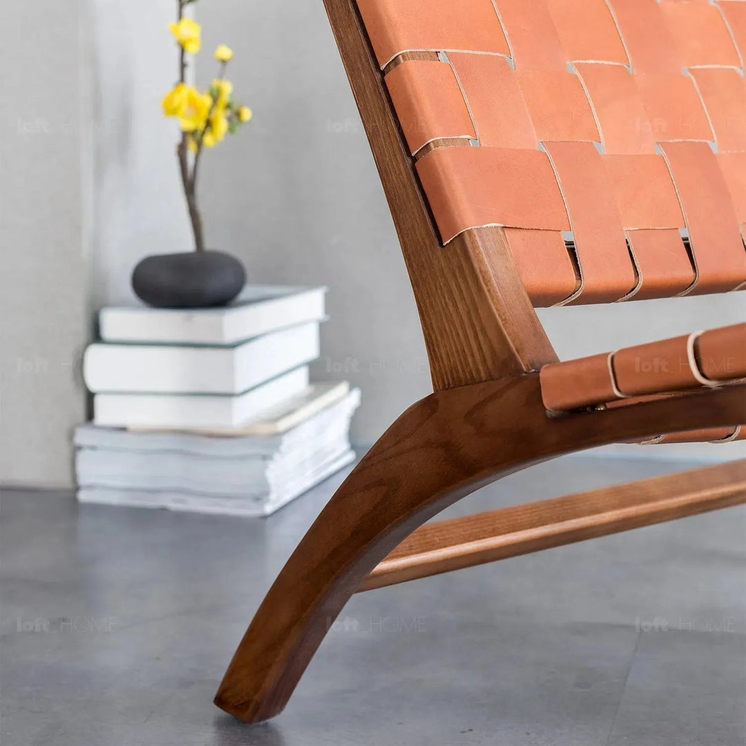 Japandi leather 1 seater sofa tanner with context.