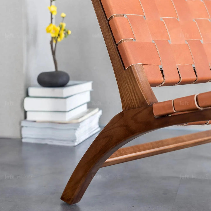 Japandi leather 1 seater sofa tanner with context.