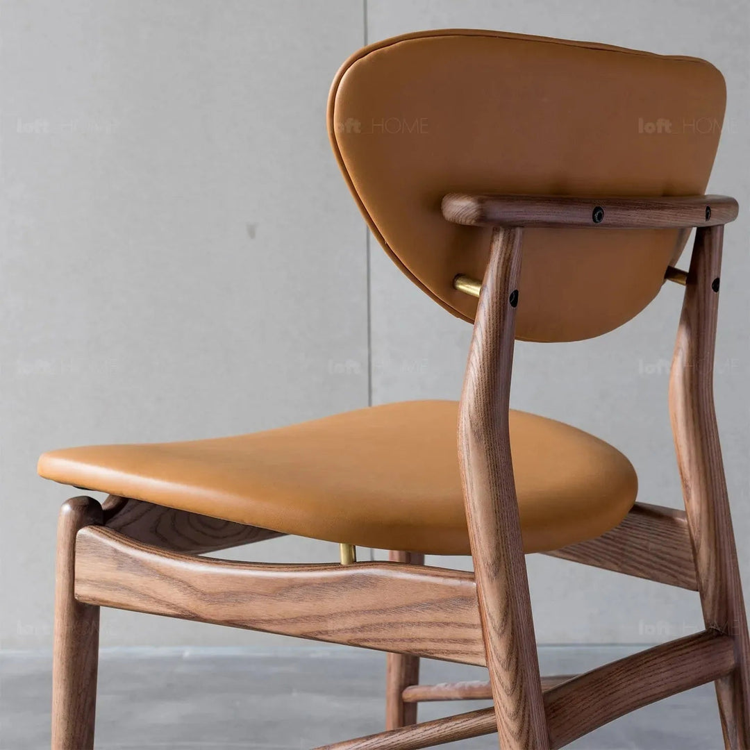 Japandi leather dining chair finn in panoramic view.