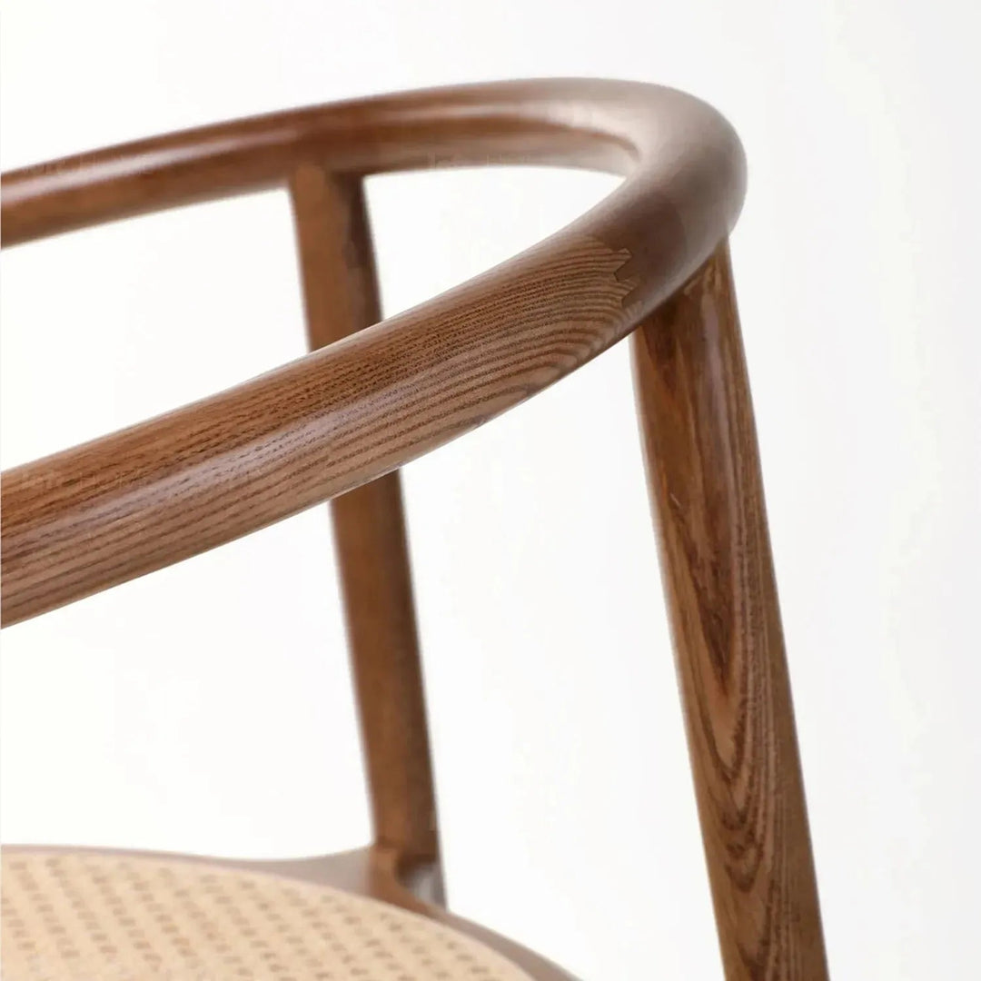 Japandi rattan dining chair circular in panoramic view.