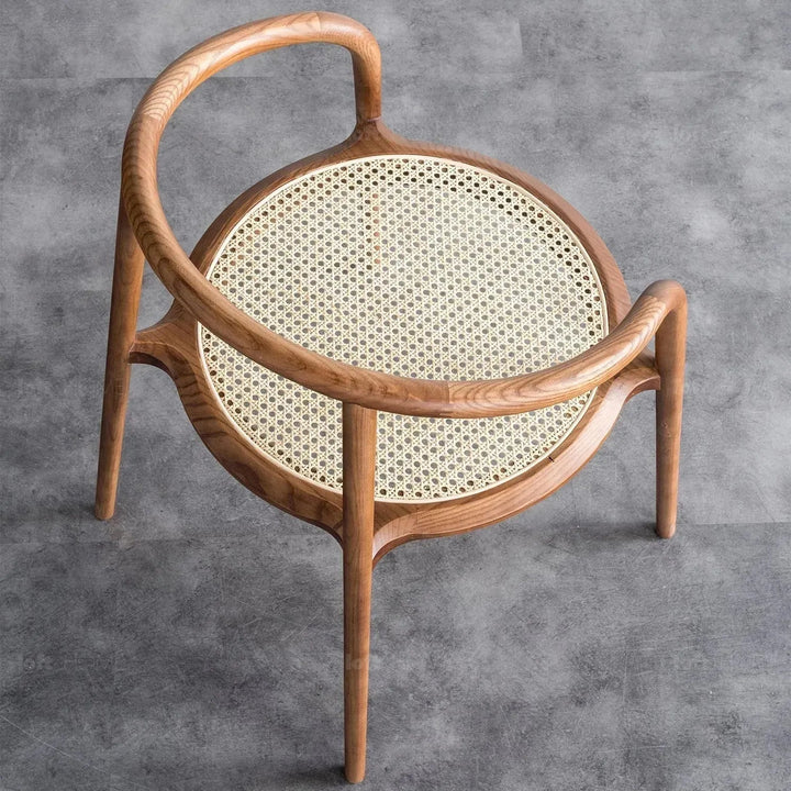 Japandi rattan dining chair circular with context.