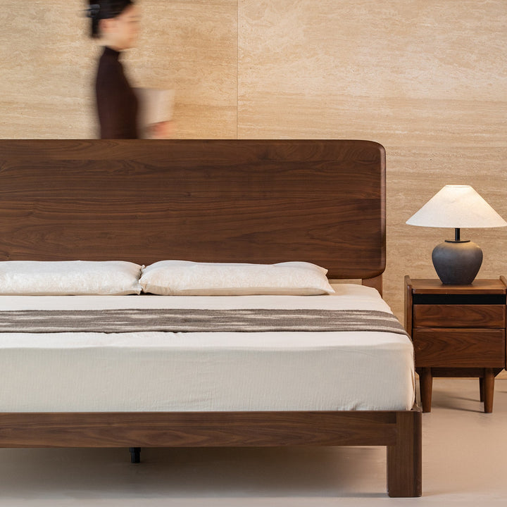 Japandi walnut wood bed dune in still life.