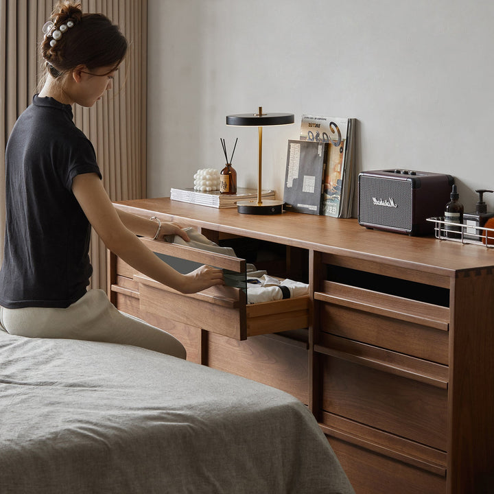 Japandi walnut wood chest of 9 drawers axis in details.