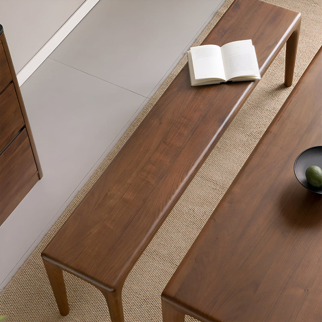 Japandi walnut wood dining bench conti in close up details.