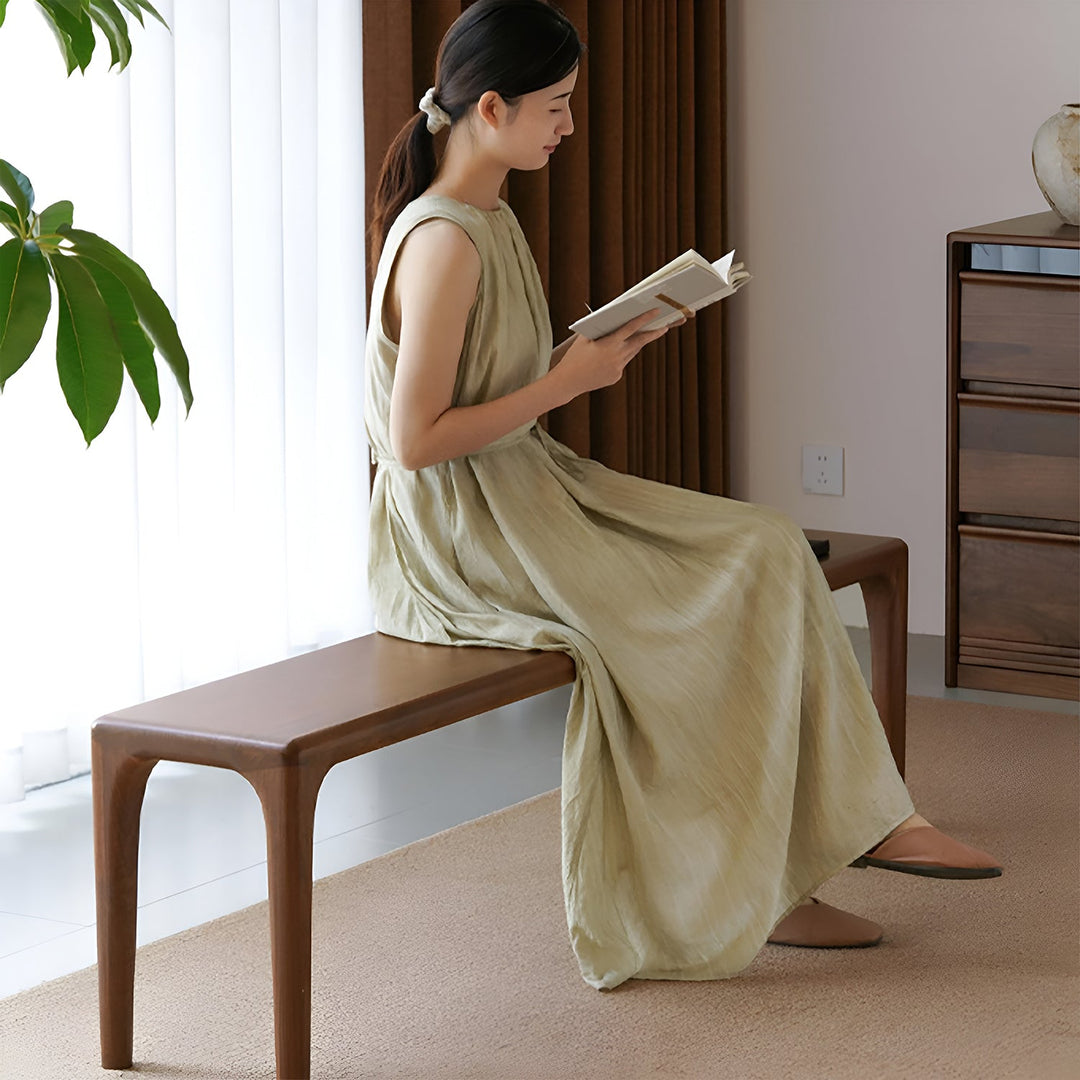 Japandi walnut wood dining bench conti in panoramic view.