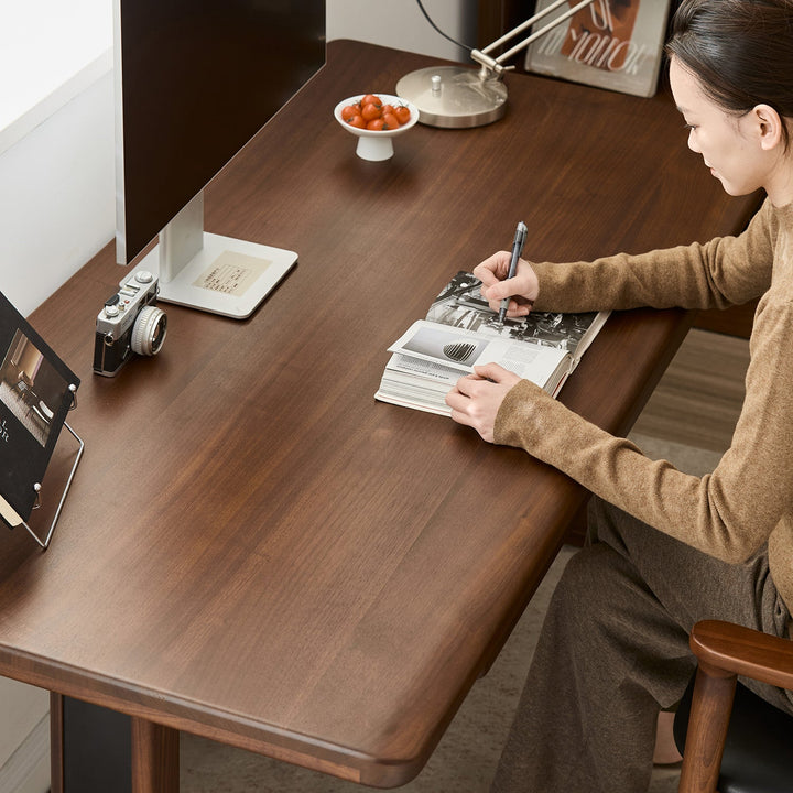 Japandi walnut wood electric height adjustable study table cloud lifting in details.