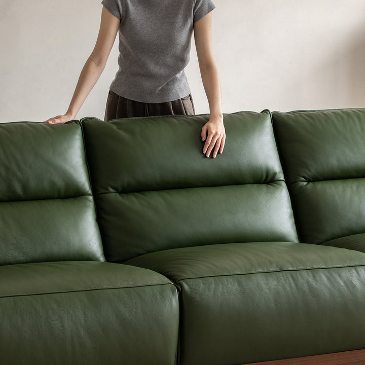 Japandi walnut wood genuine leather electric recliner 4 seater sofa edgeless in close up details.