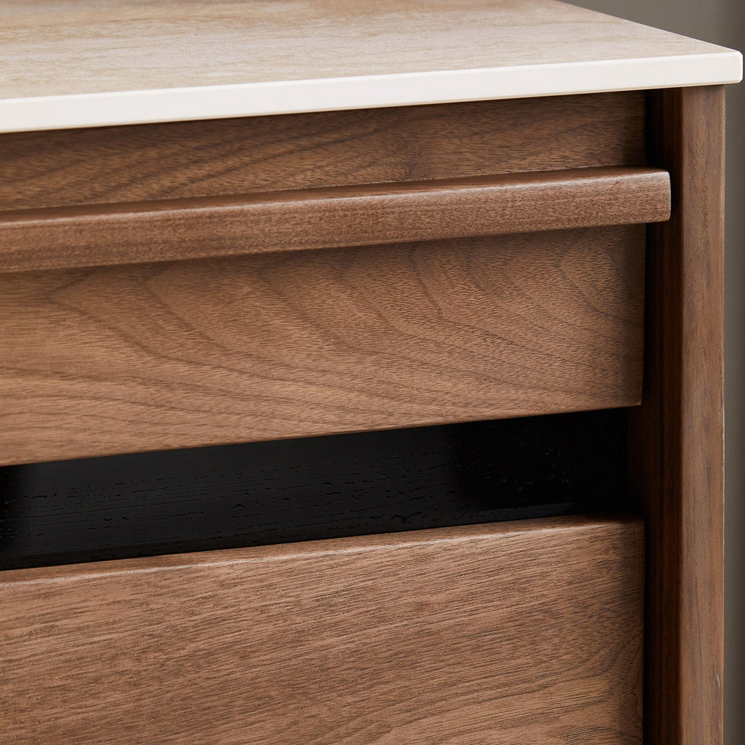 Japandi walnut wood sintered stone cabinet axis in close up details.