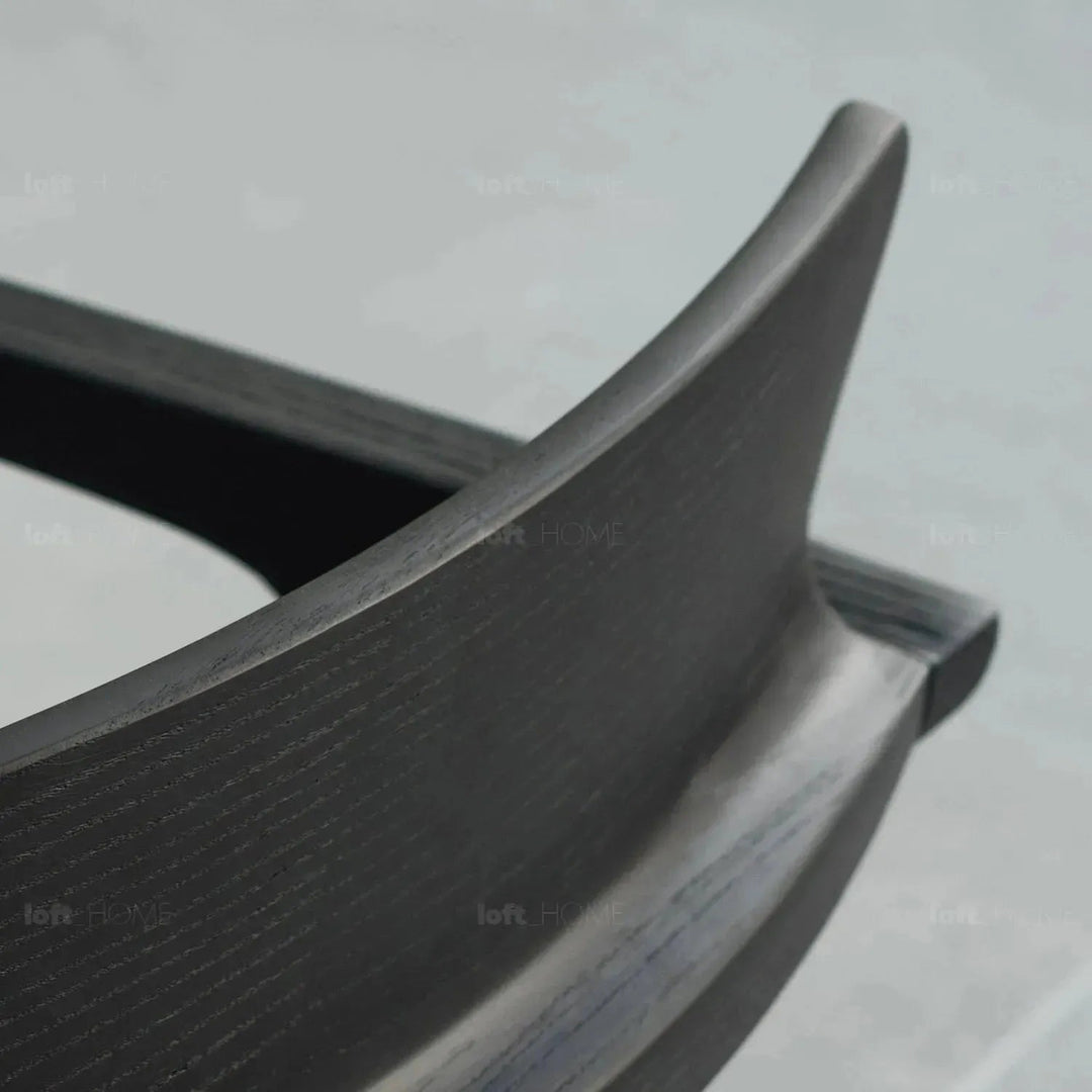 Japandi wood dining chair cuddy in panoramic view.