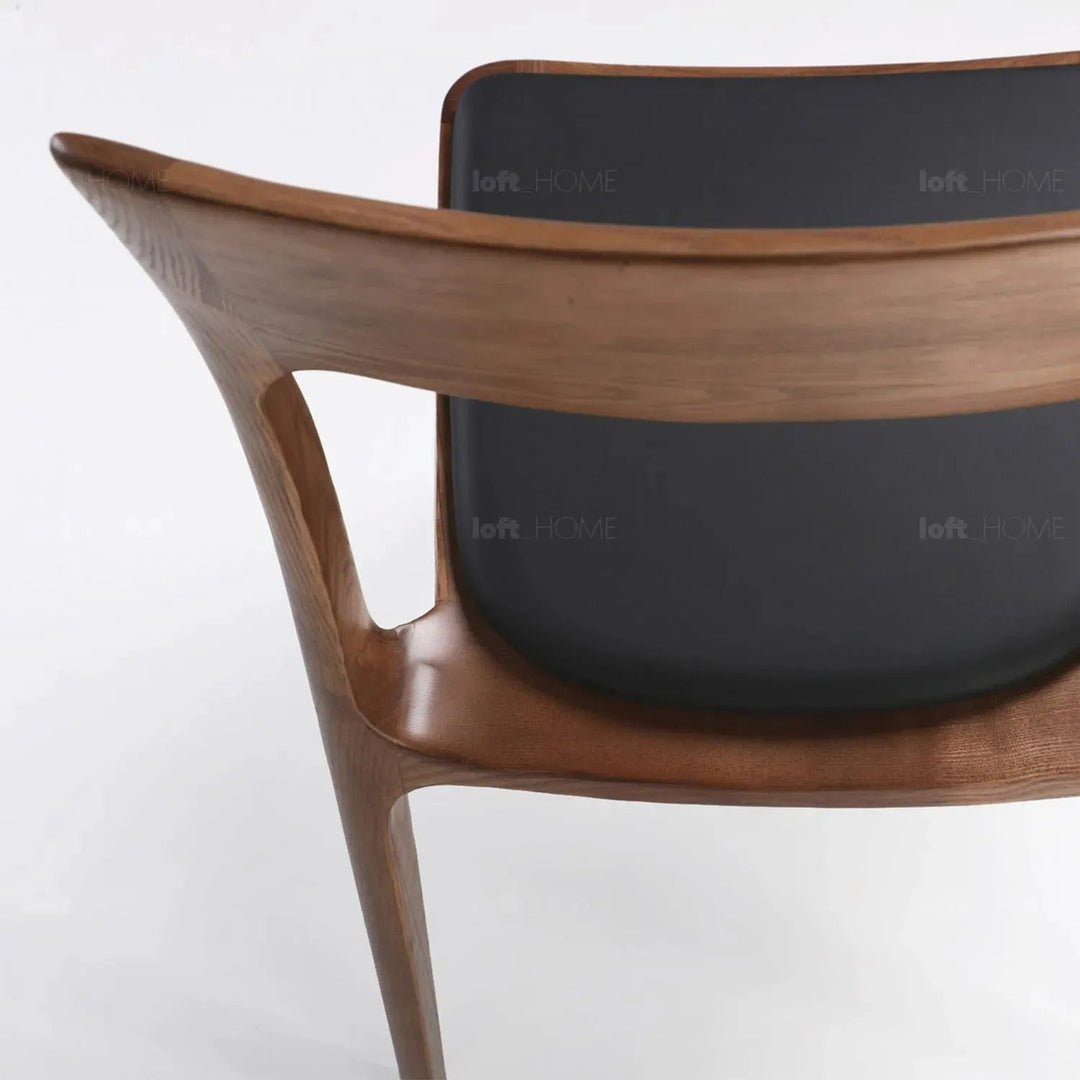 Japandi wood dining chair sleek layered structure.