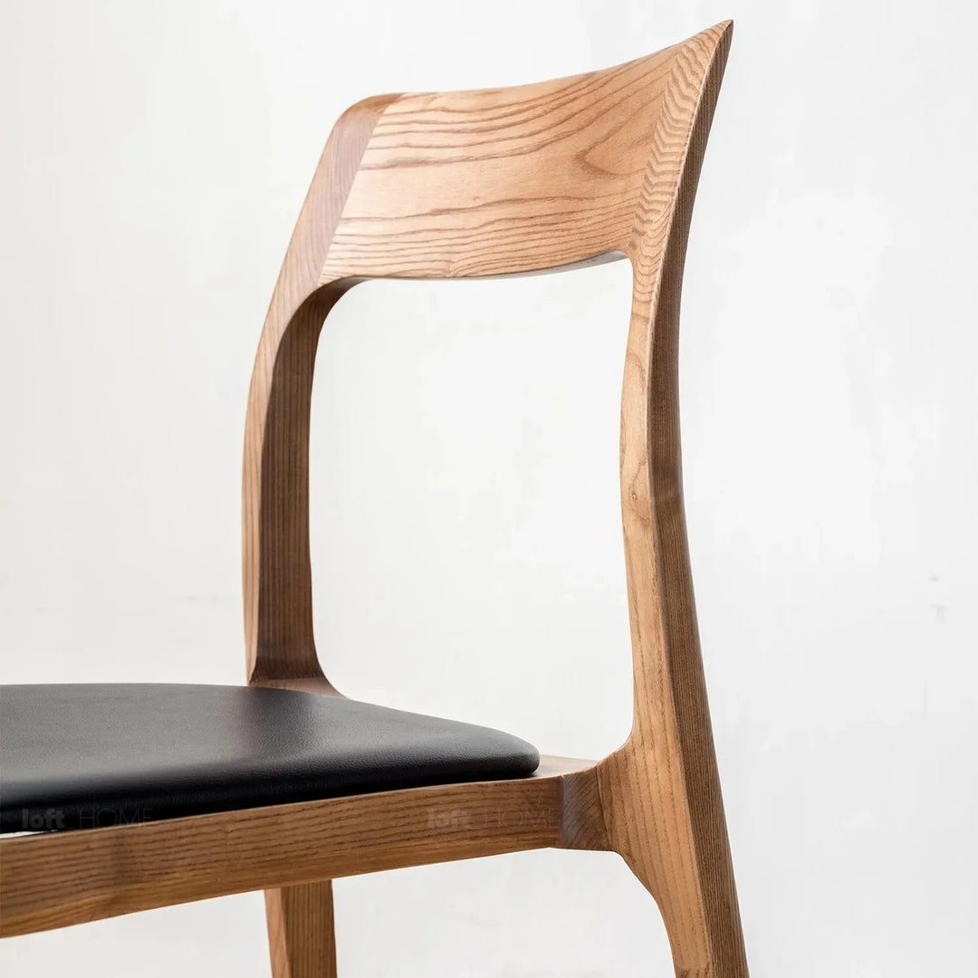 Japandi wood dining chair sleek in panoramic view.