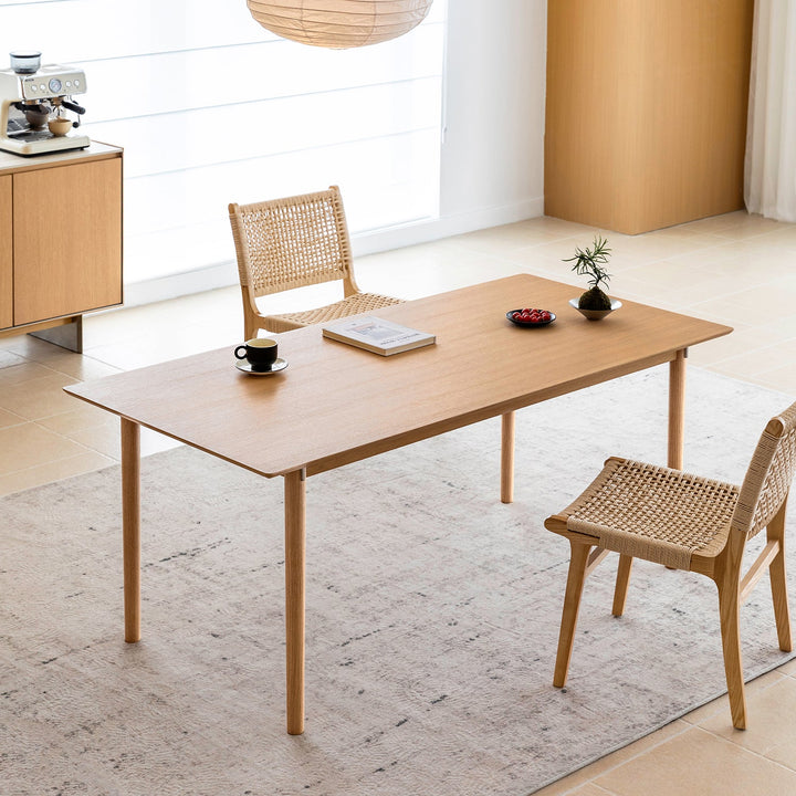 Minimalist ash wood dining table borel in details.