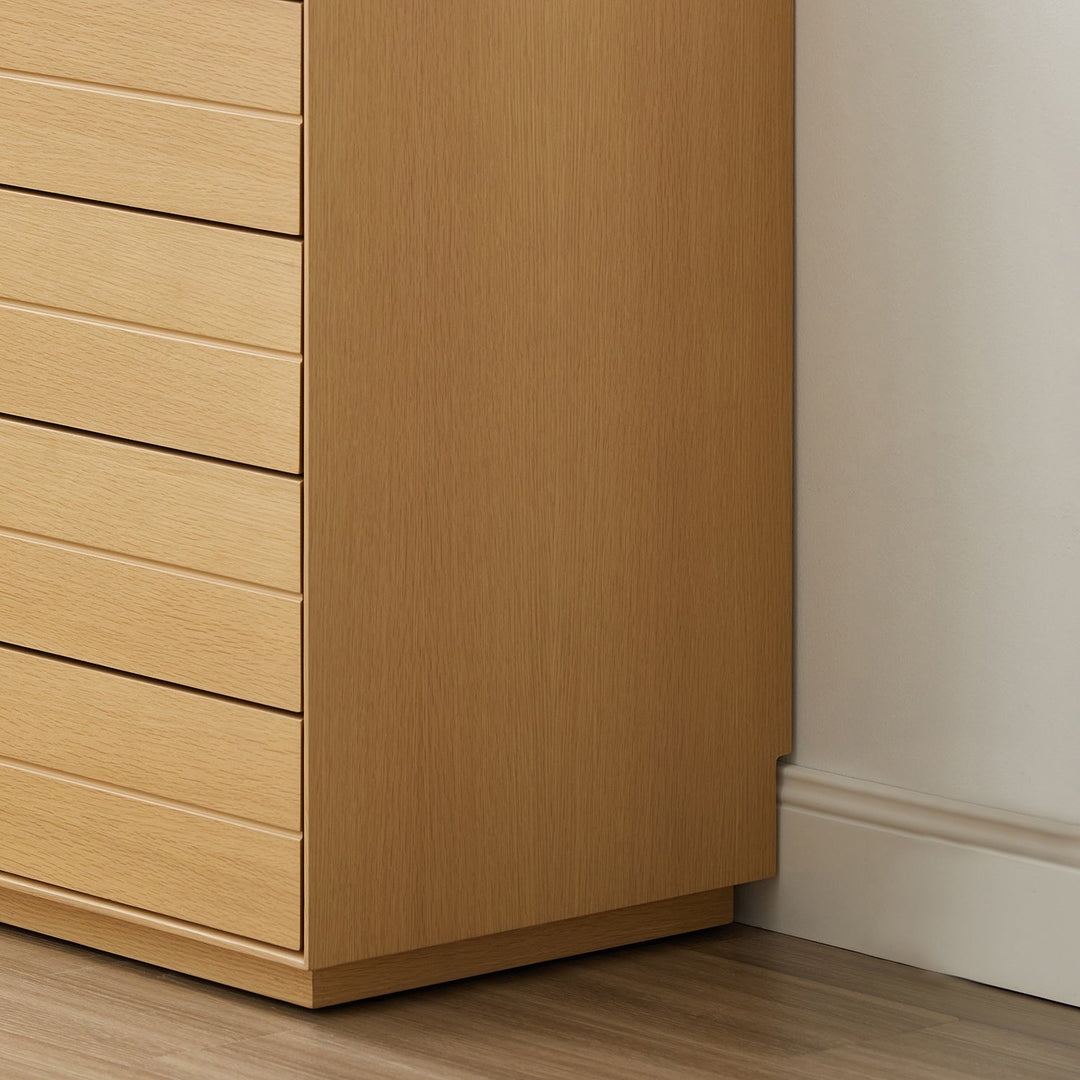 Minimalist ash wood veneer chest of 5 drawers moi in panoramic view.