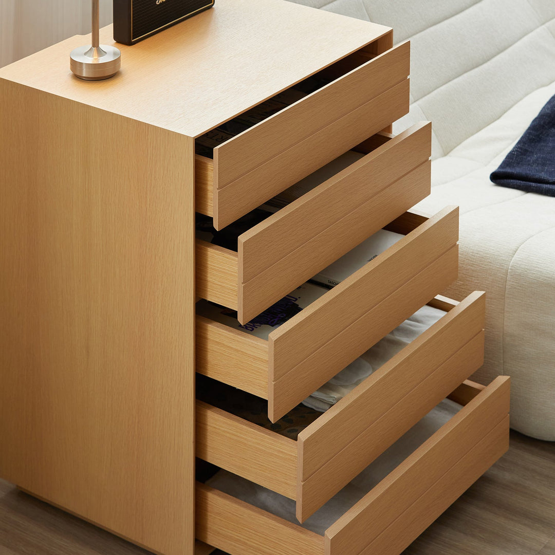 Minimalist ash wood veneer chest of 5 drawers moi with context.