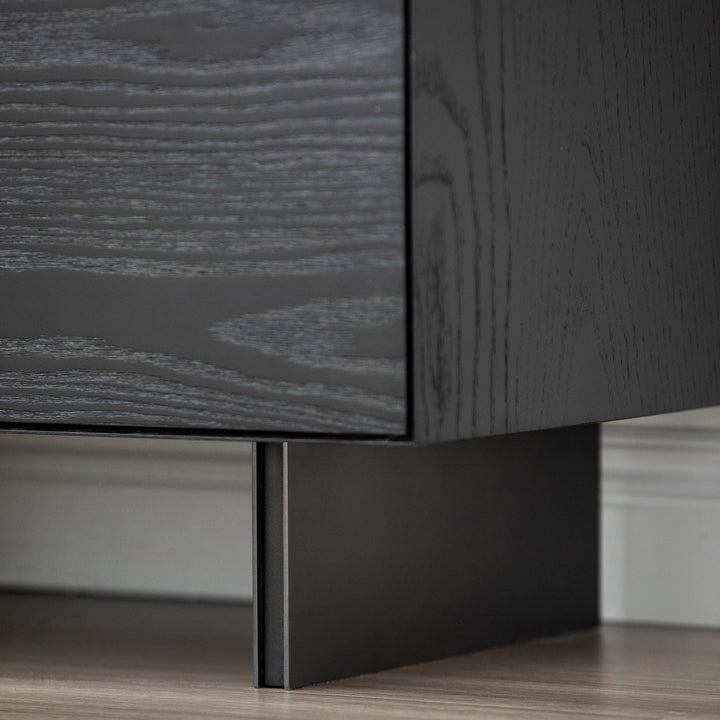 Minimalist ash wood veneer chest of 4  drawers grid in panoramic view.