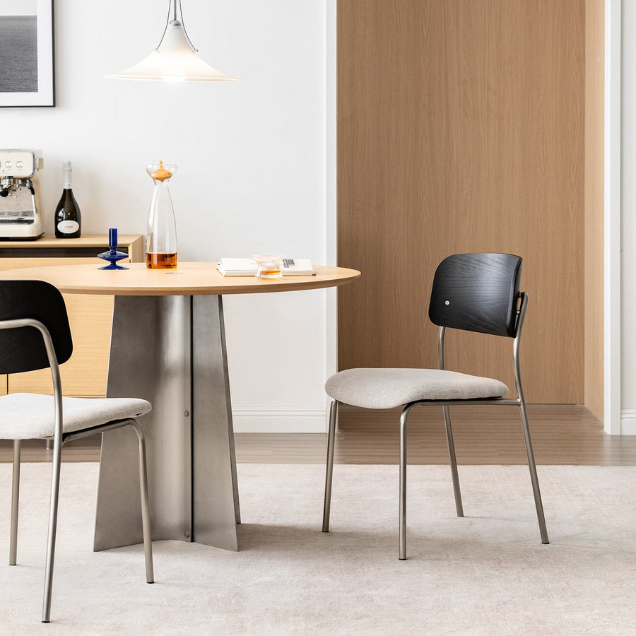 Minimalist ash wood veneer cotton fabric dining chair black aeri primary product view.