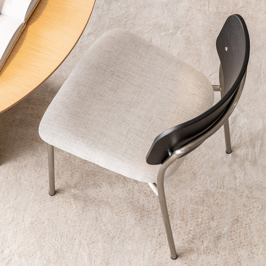 Minimalist ash wood veneer cotton fabric dining chair black aeri material variants.
