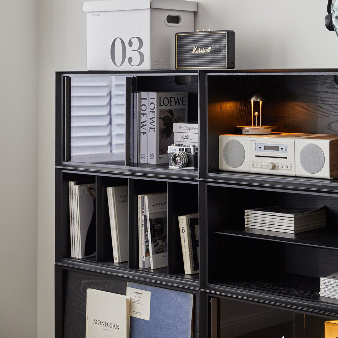 Minimalist ash wood veneer modular cabinet shadow in close up details.