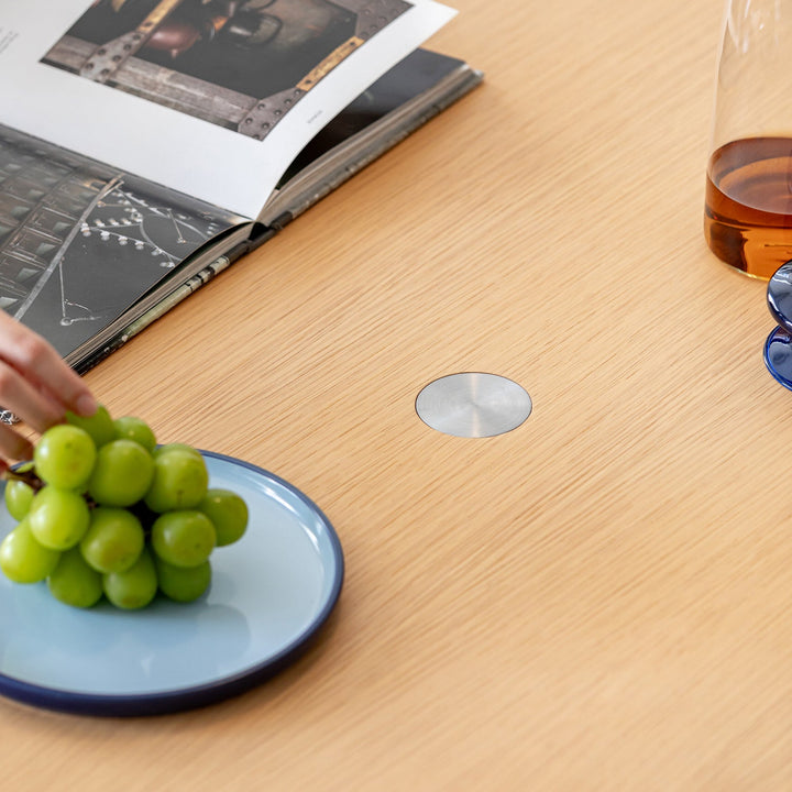Bauhaus ash wood veneer stainless steel round dining table aeri with context.