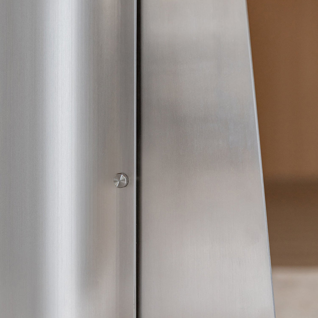 Bauhaus ash wood veneer stainless steel round dining table aeri in close up details.