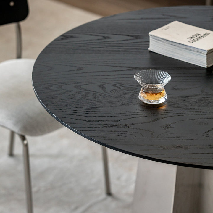 Minimalist ash wood veneer stainless steel round dining table black aeri material variants.