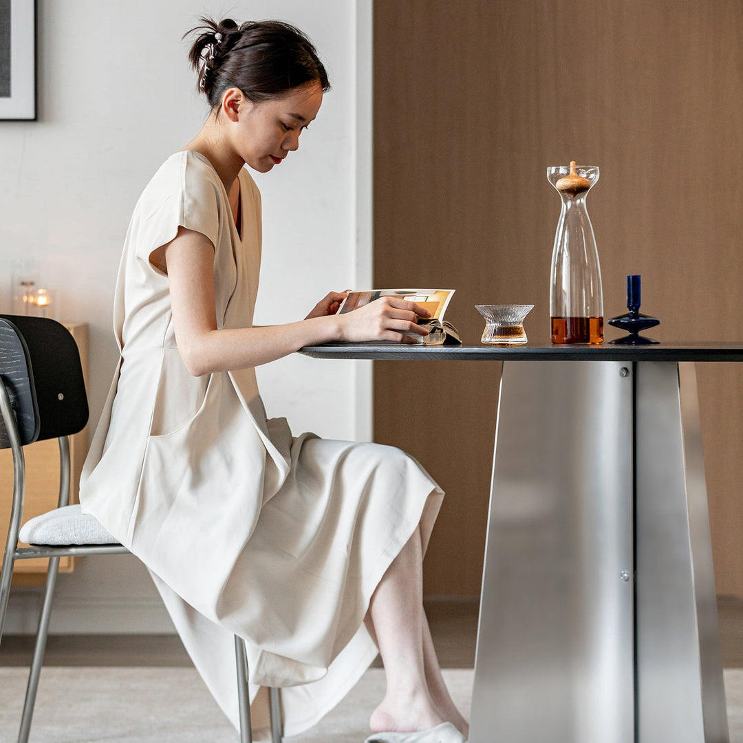 Minimalist ash wood veneer stainless steel round dining table black aeri with context.