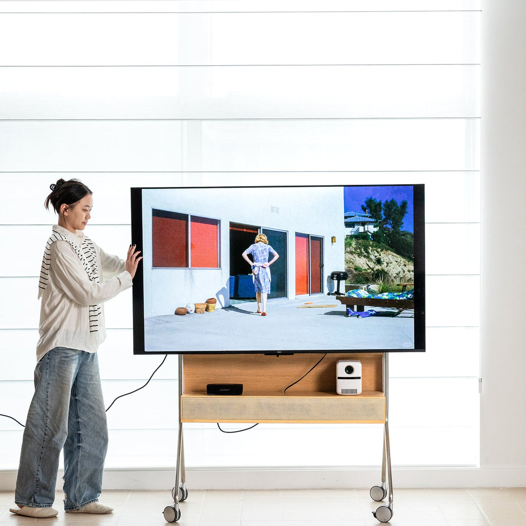 Minimalist ash wood veneer tv hanger roam with context.
