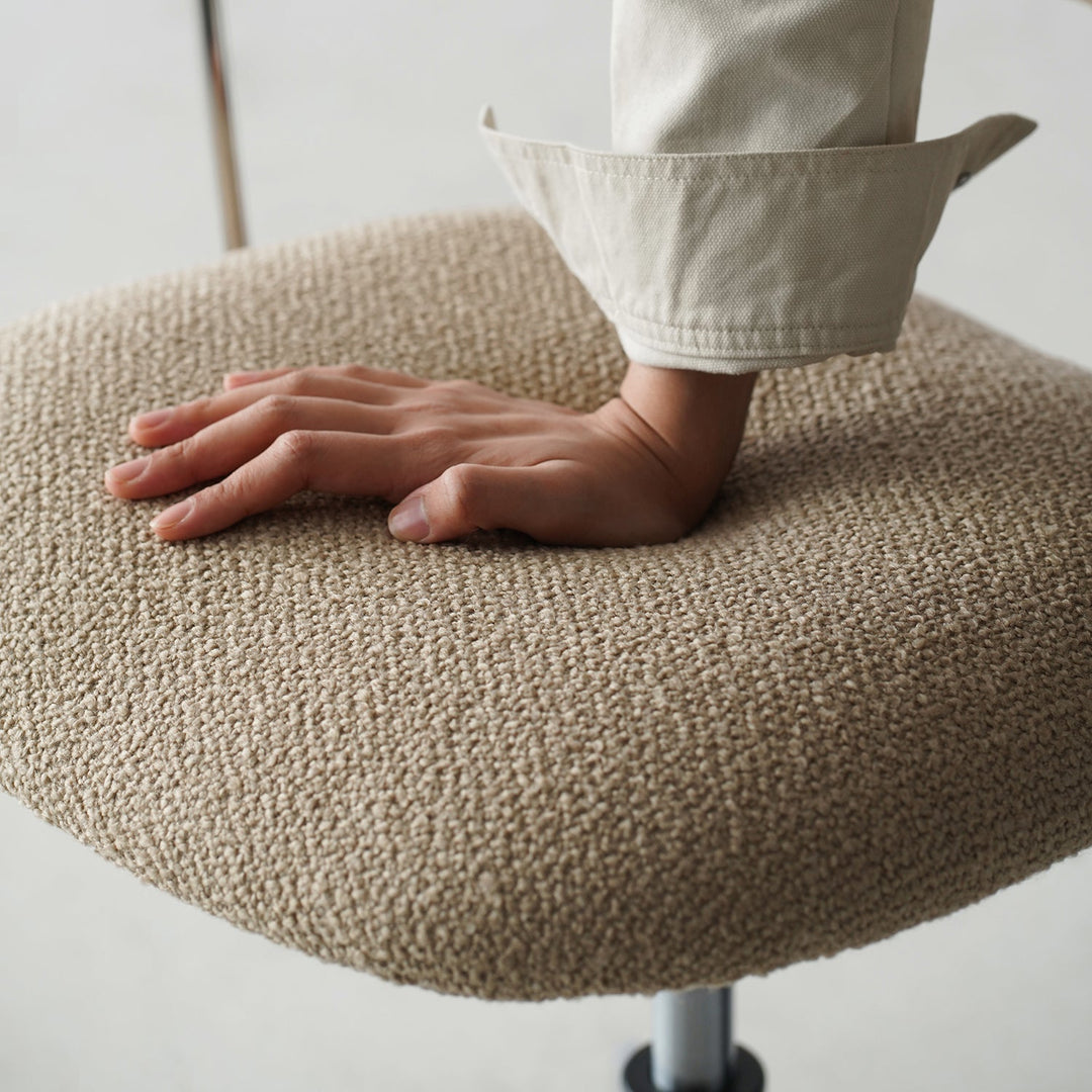 Minimalist boucle fabric study chair aodo with context.