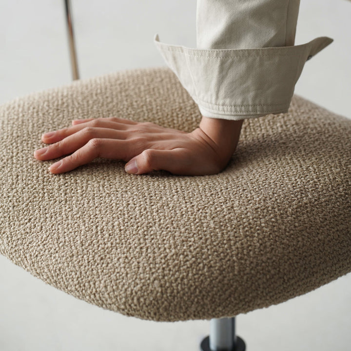 Minimalist boucle fabric study chair aodo with context.