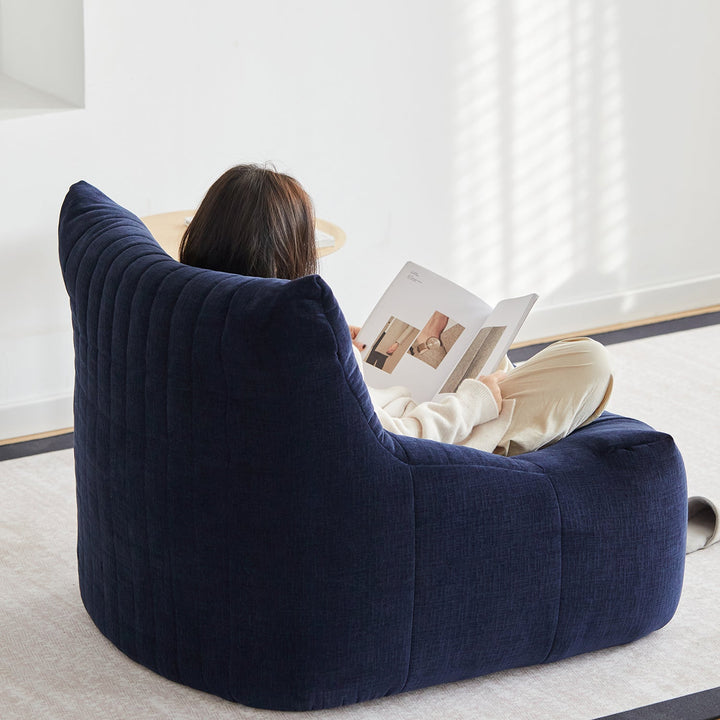 Minimalist chenille velvet fabric 1 seater sofa kait with context.