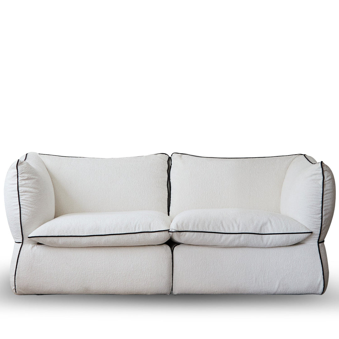 Minimalist chenille velvet fabric 2 seater sofa cloud in white background.