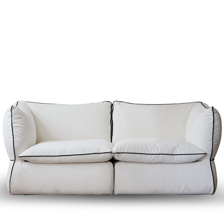 Minimalist chenille velvet fabric 2 seater sofa cloud in white background.