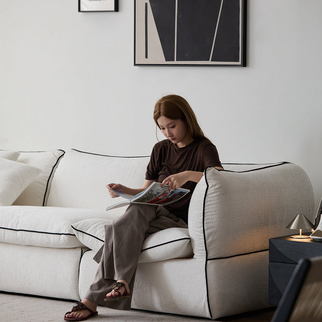 Minimalist chenille velvet fabric 3 seater sofa cloud in panoramic view.