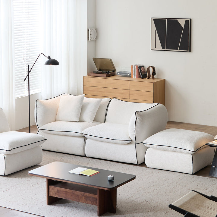 Minimalist chenille velvet fabric 3 seater sofa cloud in close up details.