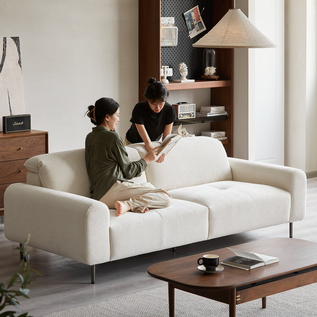 Minimalist chenille velvet fabric 3 seater sofa drift in close up details.