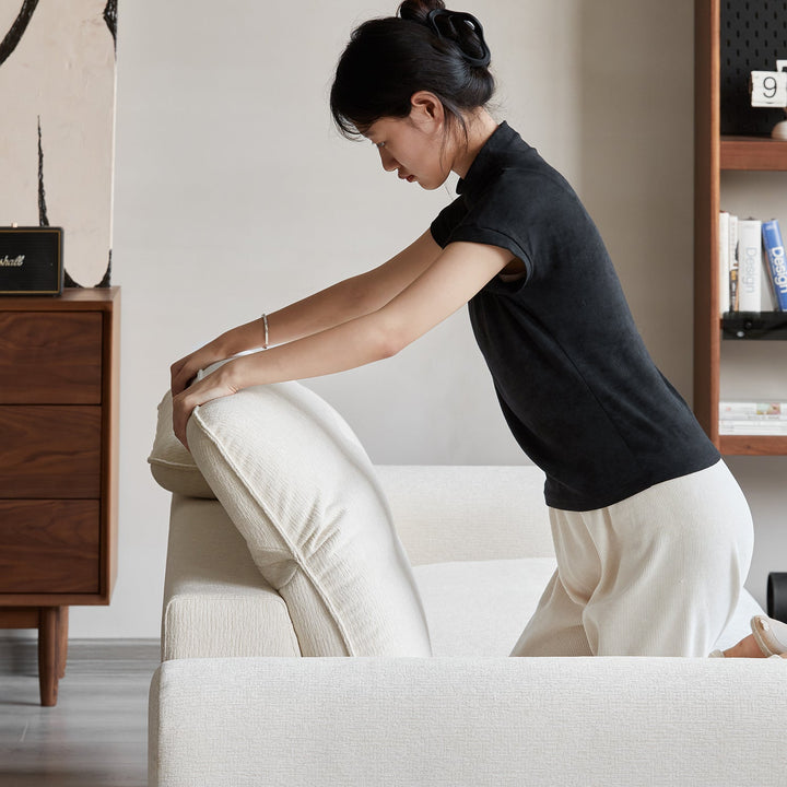 Minimalist chenille velvet fabric 3 seater sofa drift in still life.