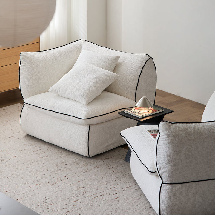 Minimalist chenille velvet fabric 4 seater sofa cloud in panoramic view.