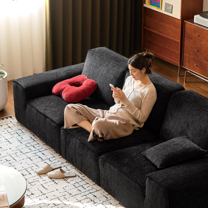 Minimalist chenille velvet fabric 4 seater sofa tufty time in panoramic view.