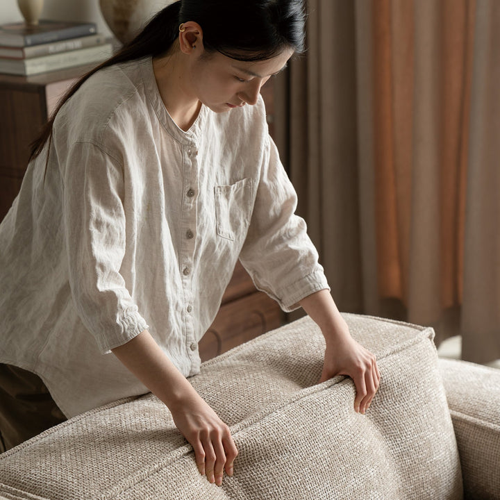 Minimalist linen fabric 3 seater sofa camaleonda in panoramic view.