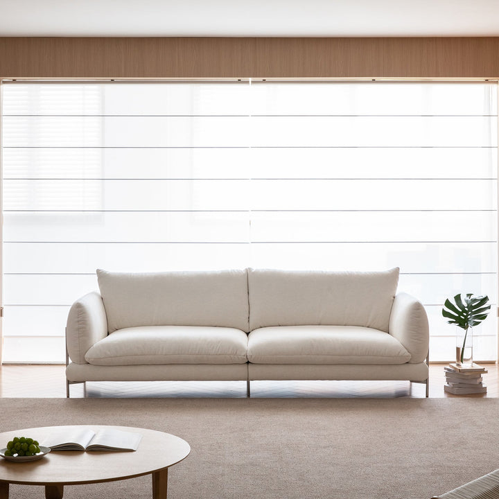 Minimalist cotton fabric 4 seater sofa como in real life style.