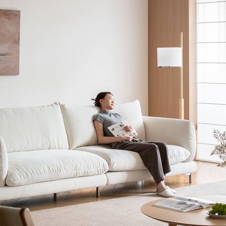 Minimalist cotton fabric 4 seater sofa como in details.