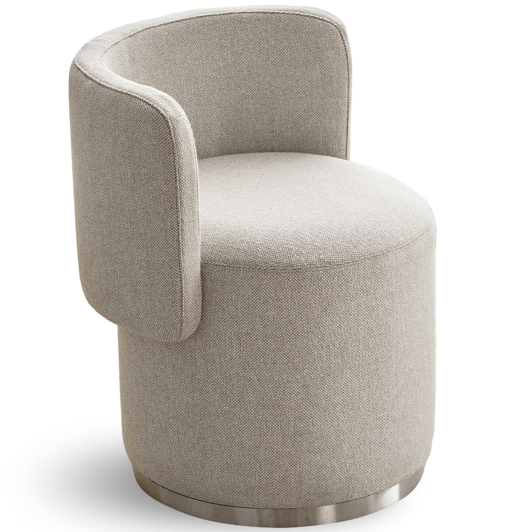 Minimalist cotton fabric dressing chair noel in white background.
