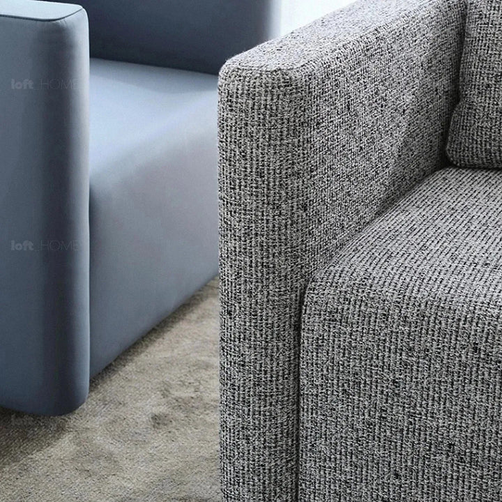 Minimalist fabric 1 seater revolving sofa variegated conceptual design.