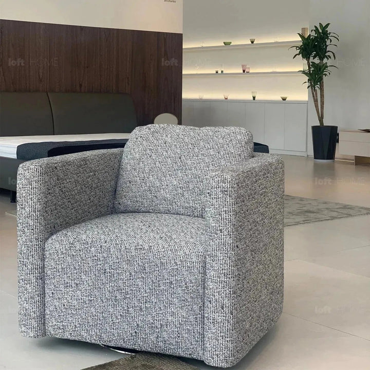 Minimalist fabric 1 seater revolving sofa variegated situational feels.